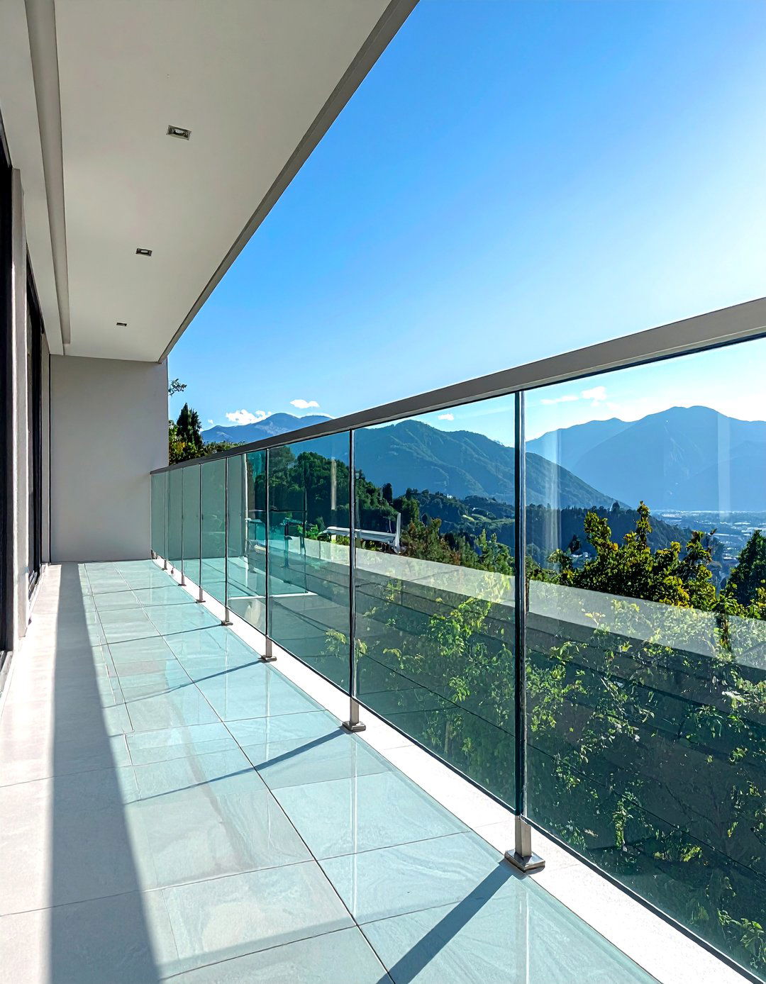 Minimalist Glass Balcony Rails - 25 Glass Balcony Design Ideas for a Modern and Open Feel