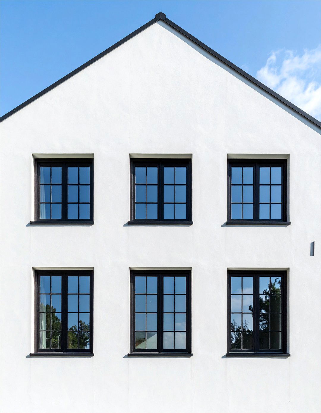 Modern Tudor with Geometric Window Designs - 30 Modern Tudor Exterior Inspiration Ideas
