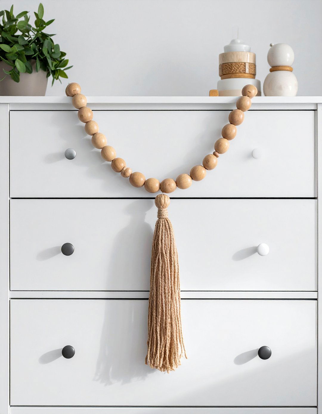 Natural Wood Bead Garland as a Boho Nursery Accent - 30 Boho Nursery Ideas for a Cozy and Stylish Space