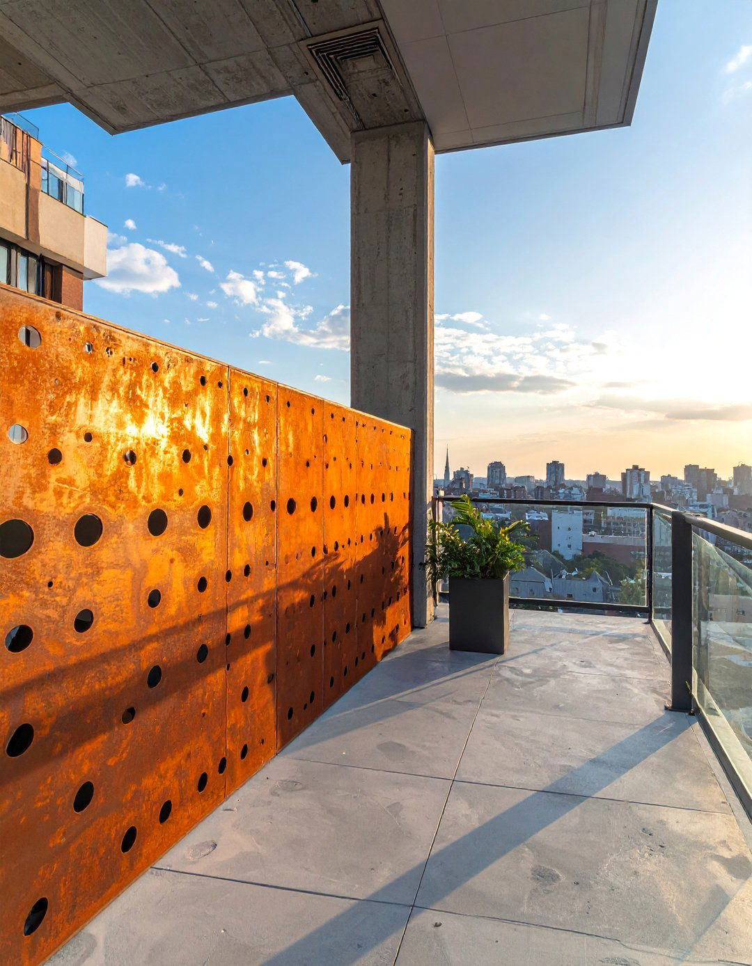 Perforated Corten Steel Balcony Divider - 20 Balcony Divider Ideas for Privacy and Style