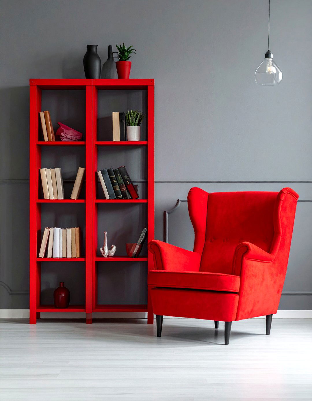 Red Bookshelves Against a Grey Wall - 25 Red and Grey Living Room Ideas for a Modern Look