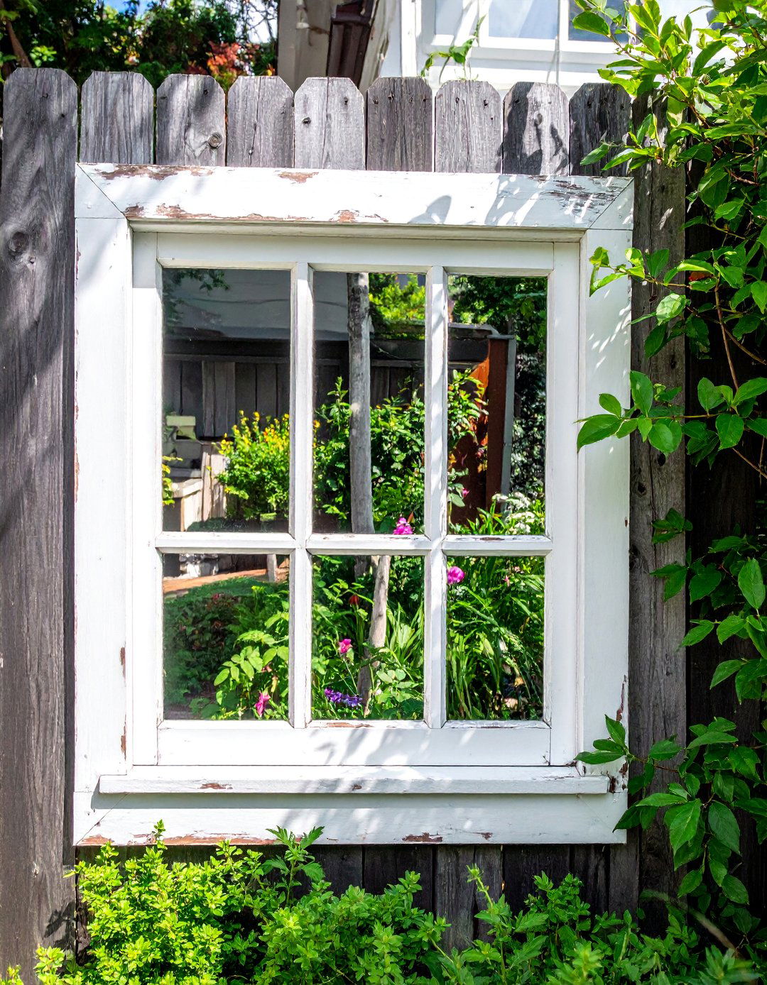 Repurposed Window Frame Fence Art - 20 Fence Art Ideas to Beautify Your Outdoor Space