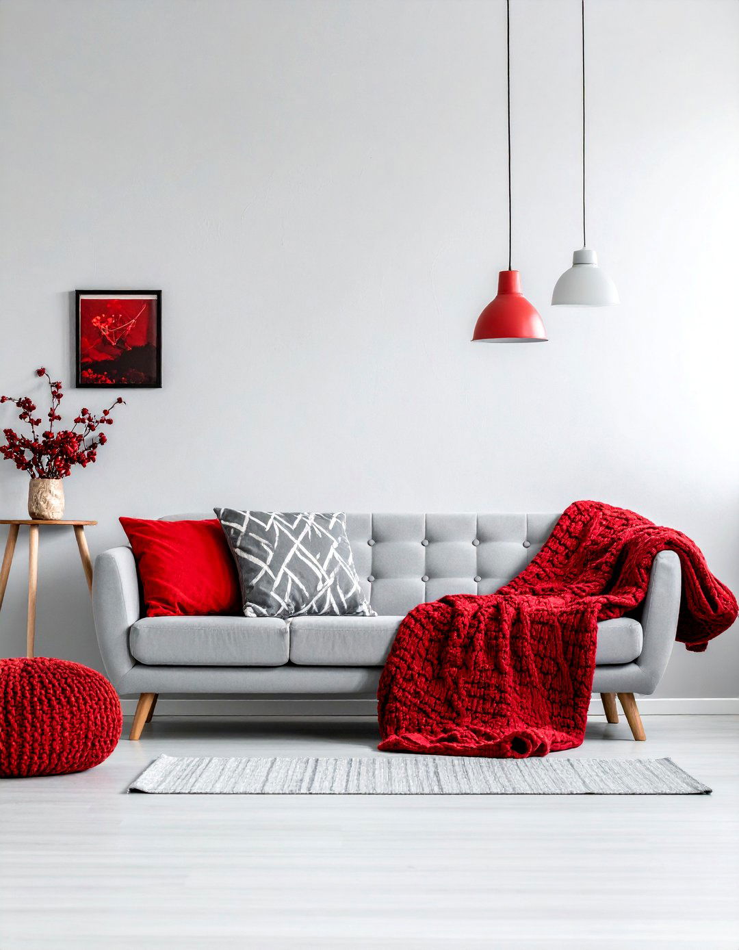 Scandinavian Design with Grey Tones and Red Textiles - 25 Red and Grey Living Room Ideas for a Modern Look