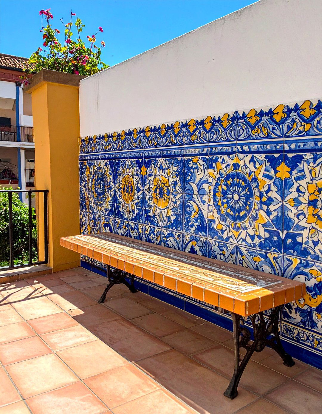 Spanish Style Painted Tiles for a Mediterranean Balcony - 20 Mediterranean Balcony Ideas for a Scenic Escape