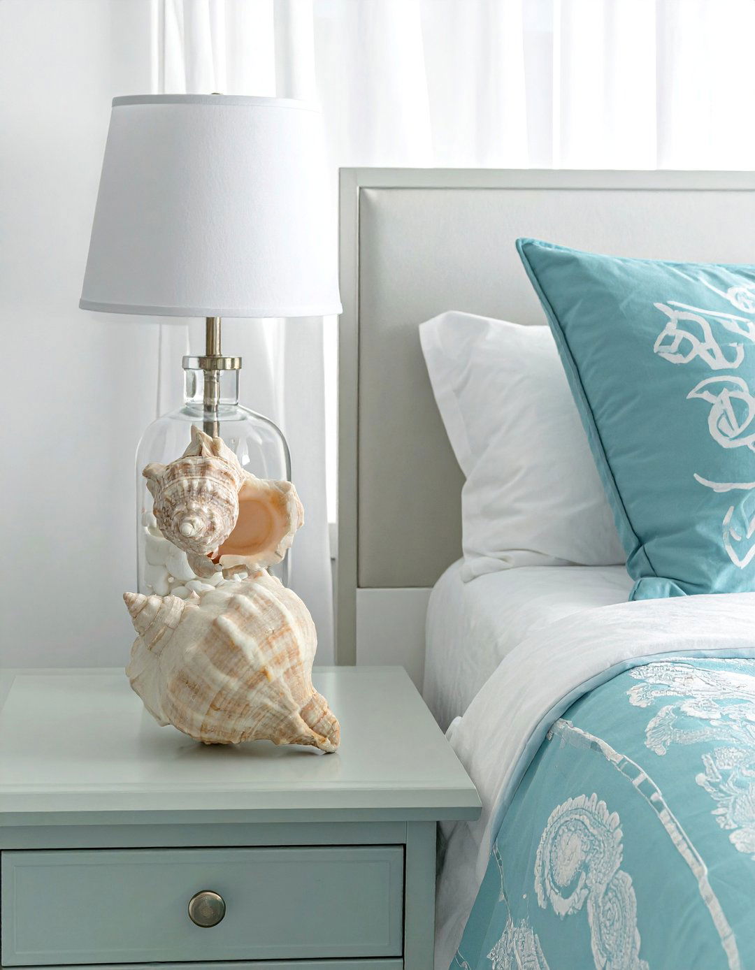 Subtle Seashell and Starfish Decor in an Ocean themed Bedroom - 40 Ocean-themed Bedroom Ideas for a Serene Retreat