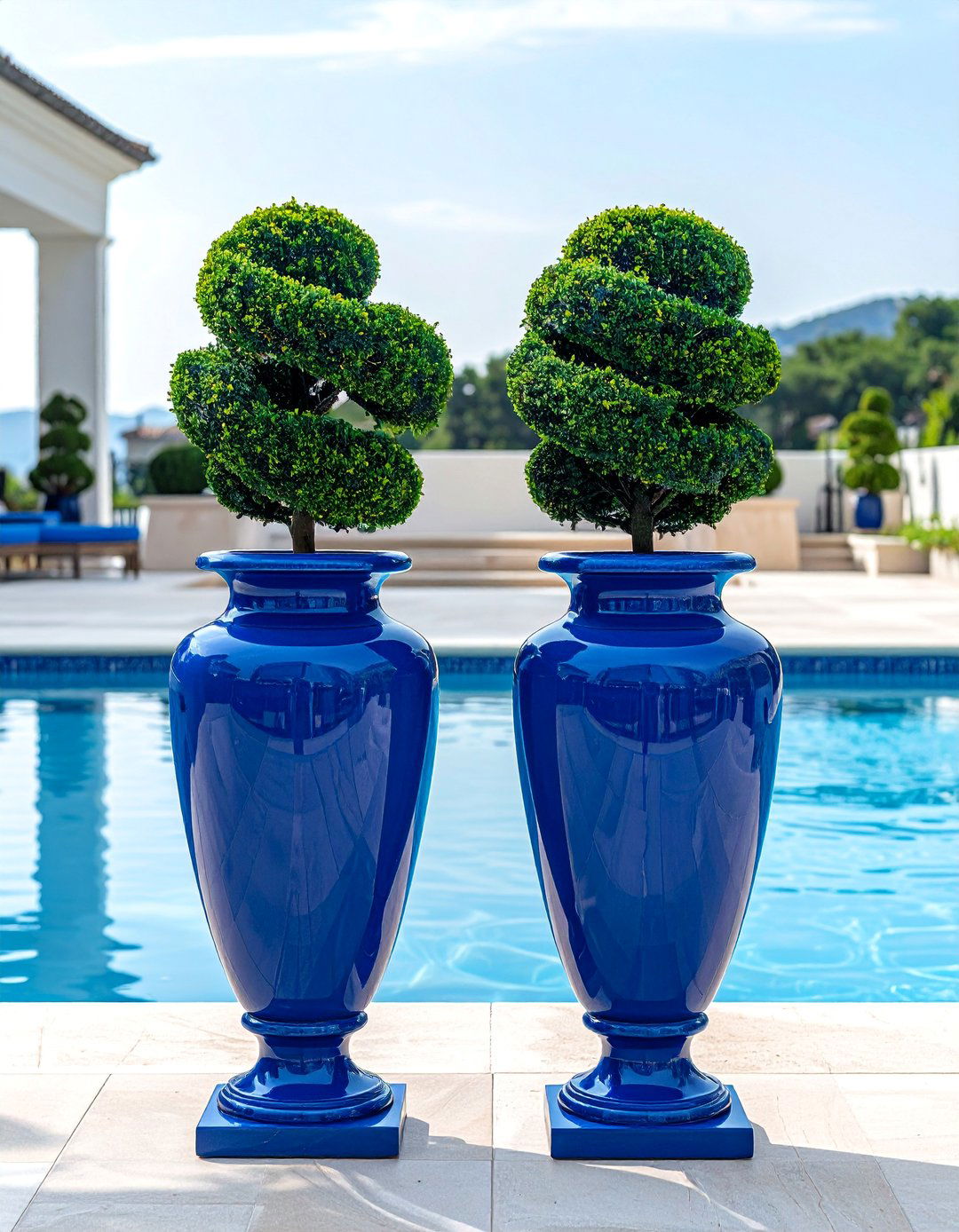 Symmetrical Glazed Ceramic Pool Planters - 30 Pool Planter Ideas for a Lush Backyard Oasis