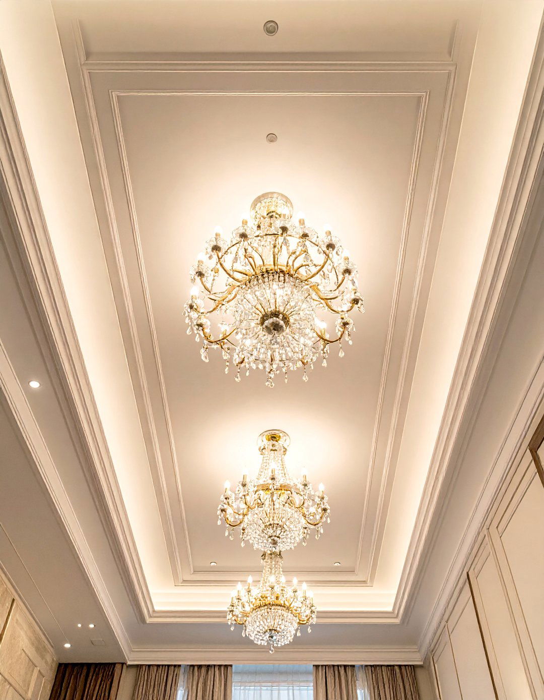 Tray Ceiling with Crystal Chandeliers - 20 Living Room False Ceiling Design Ideas for Elegance