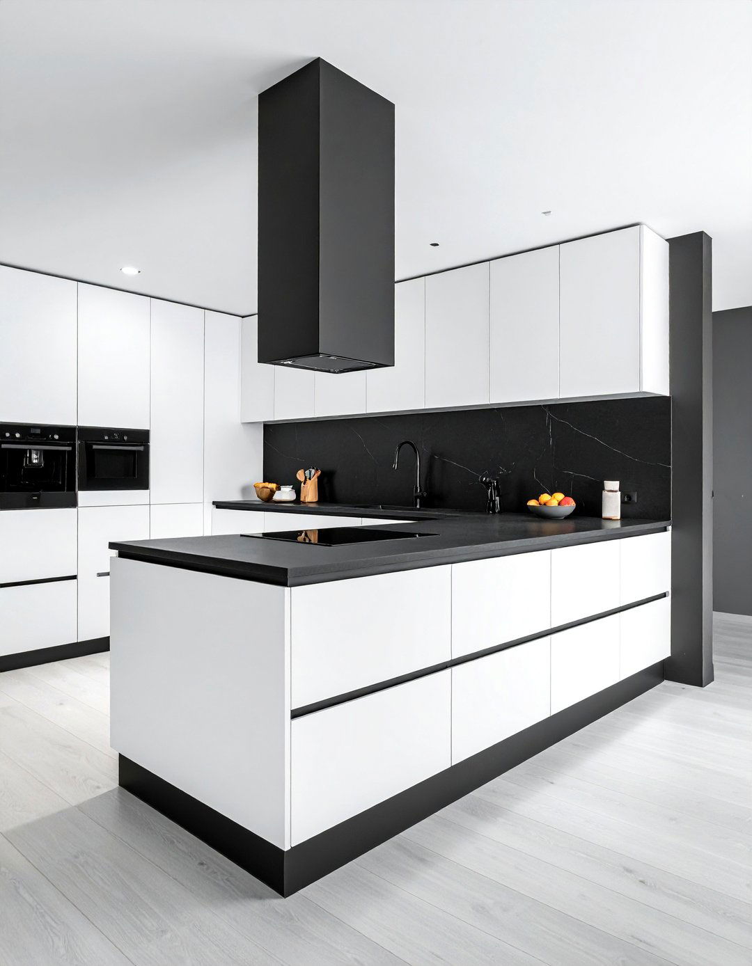 White Kitchen with Black Countertops and a Matching Black Slab Backsplash - 40 White Kitchen Ideas with Black Countertops