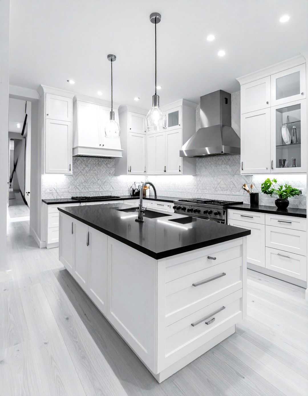 White Kitchen with a Black Waterfall Countertop Island - 40 White Kitchen Ideas with Black Countertops