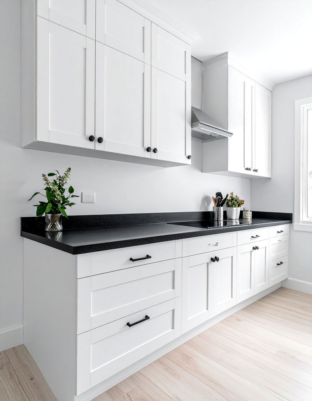 White Kitchen with a Honed Black Granite Countertop - 40 White Kitchen Ideas with Black Countertops