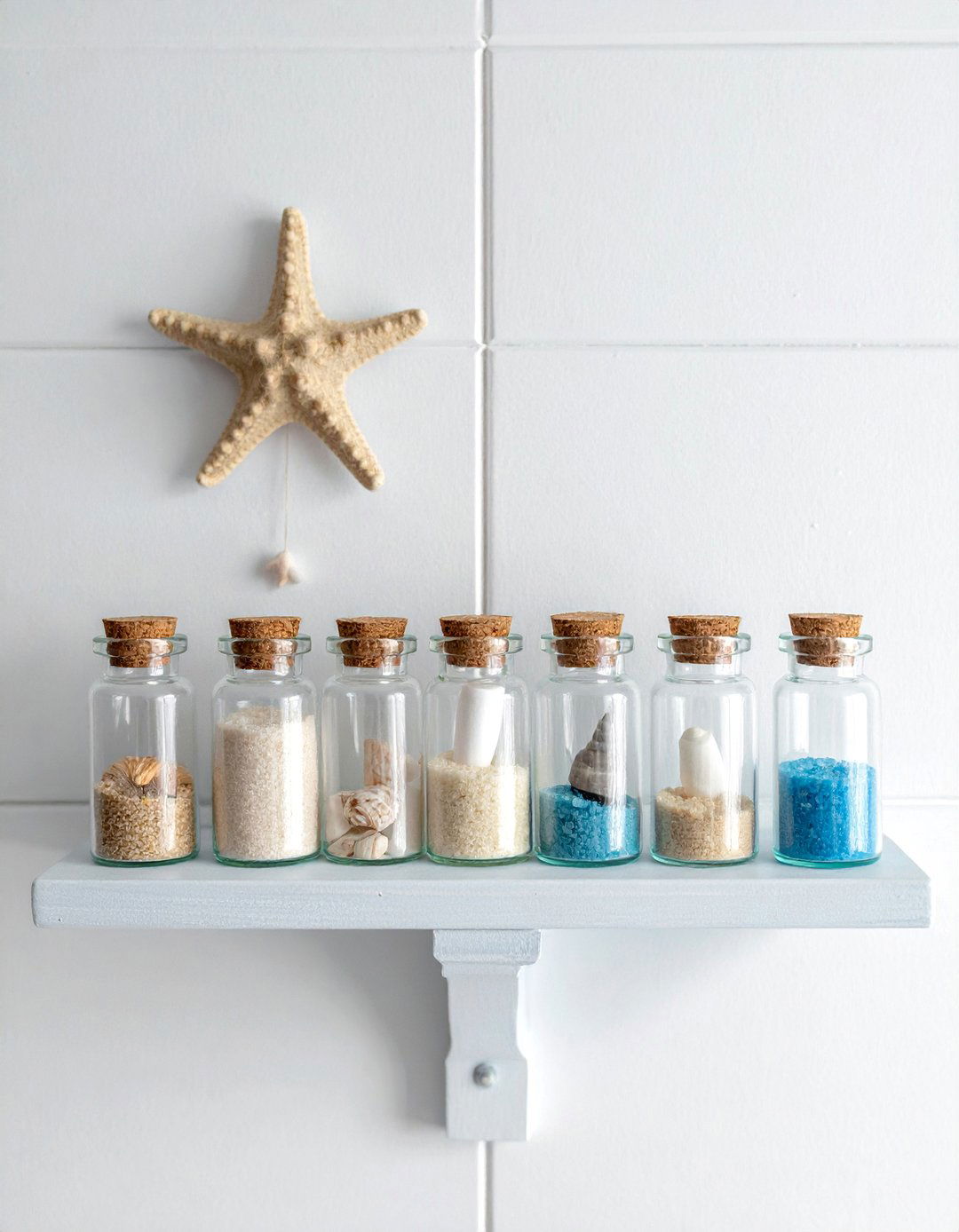 A Nautical Nursery with a Message in a Bottle Display - 25 Nautical Nursery Ideas for a Coastal-Themed Baby Room