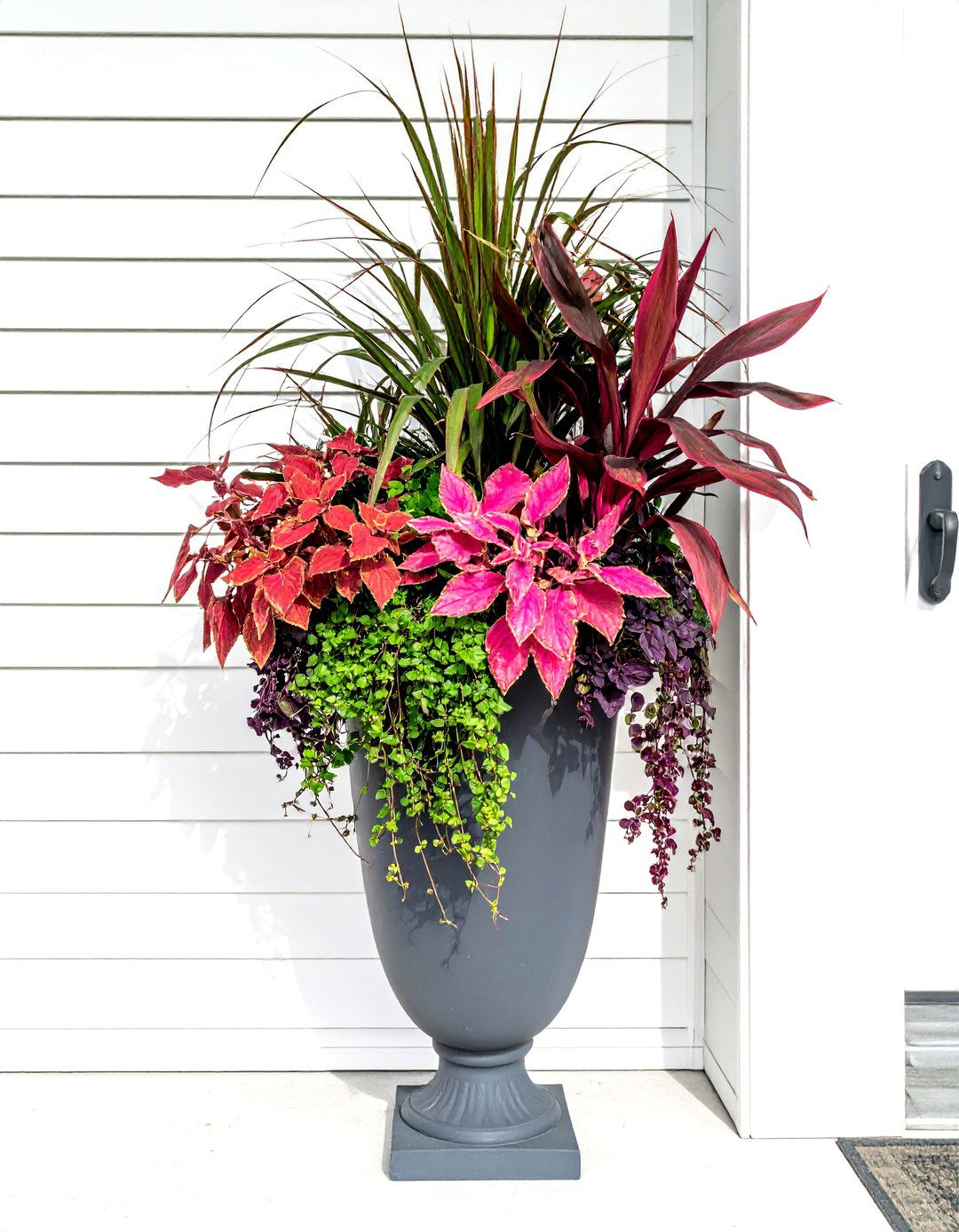A Tall Planter with a Thriller Filler Spiller Design - 40 Front Porch Ideas to Welcome Guests in Style