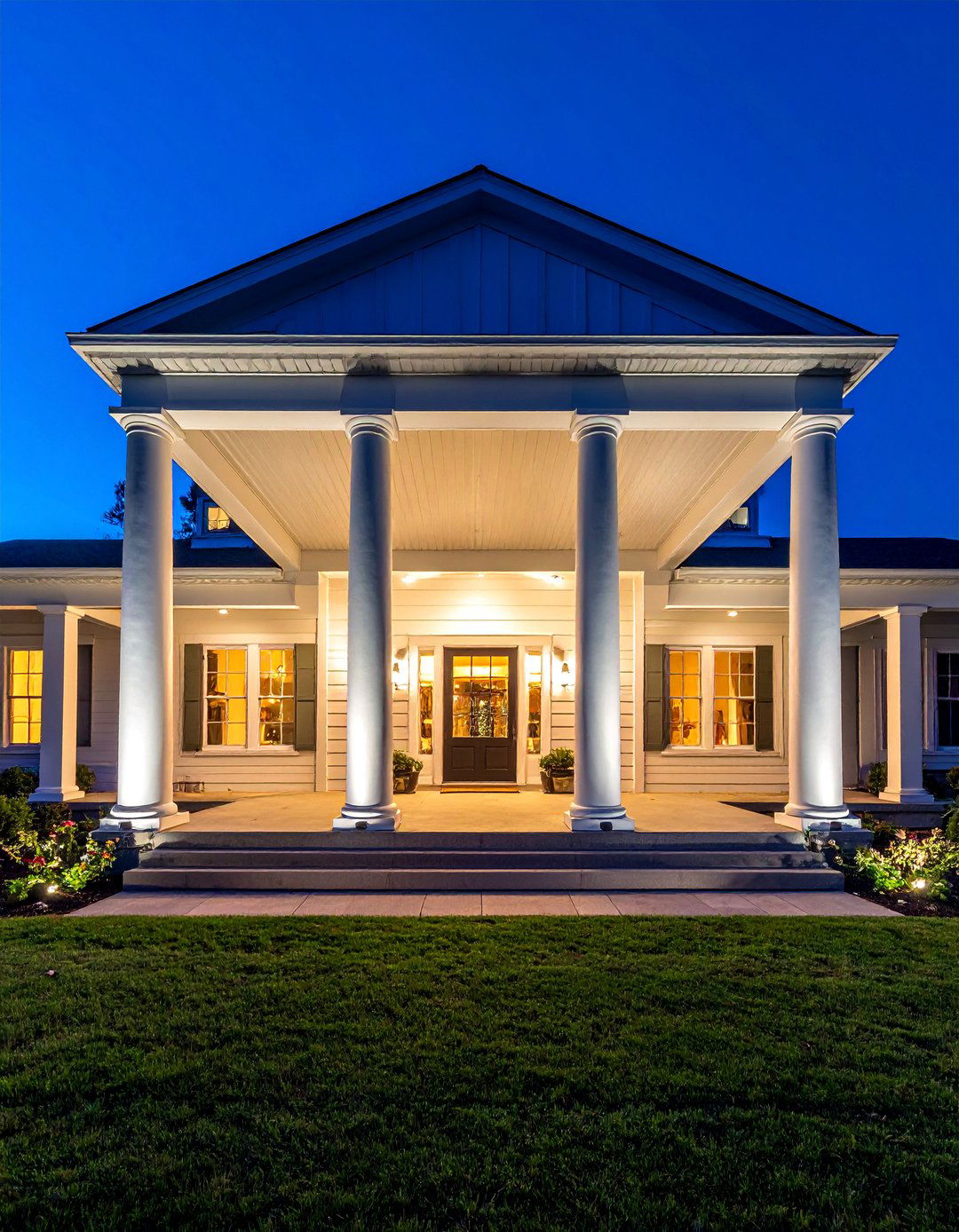 Architectural Uplighting on Columns - 20 Front Porch Lighting Ideas to Enhance Your Home's Curb Appeal