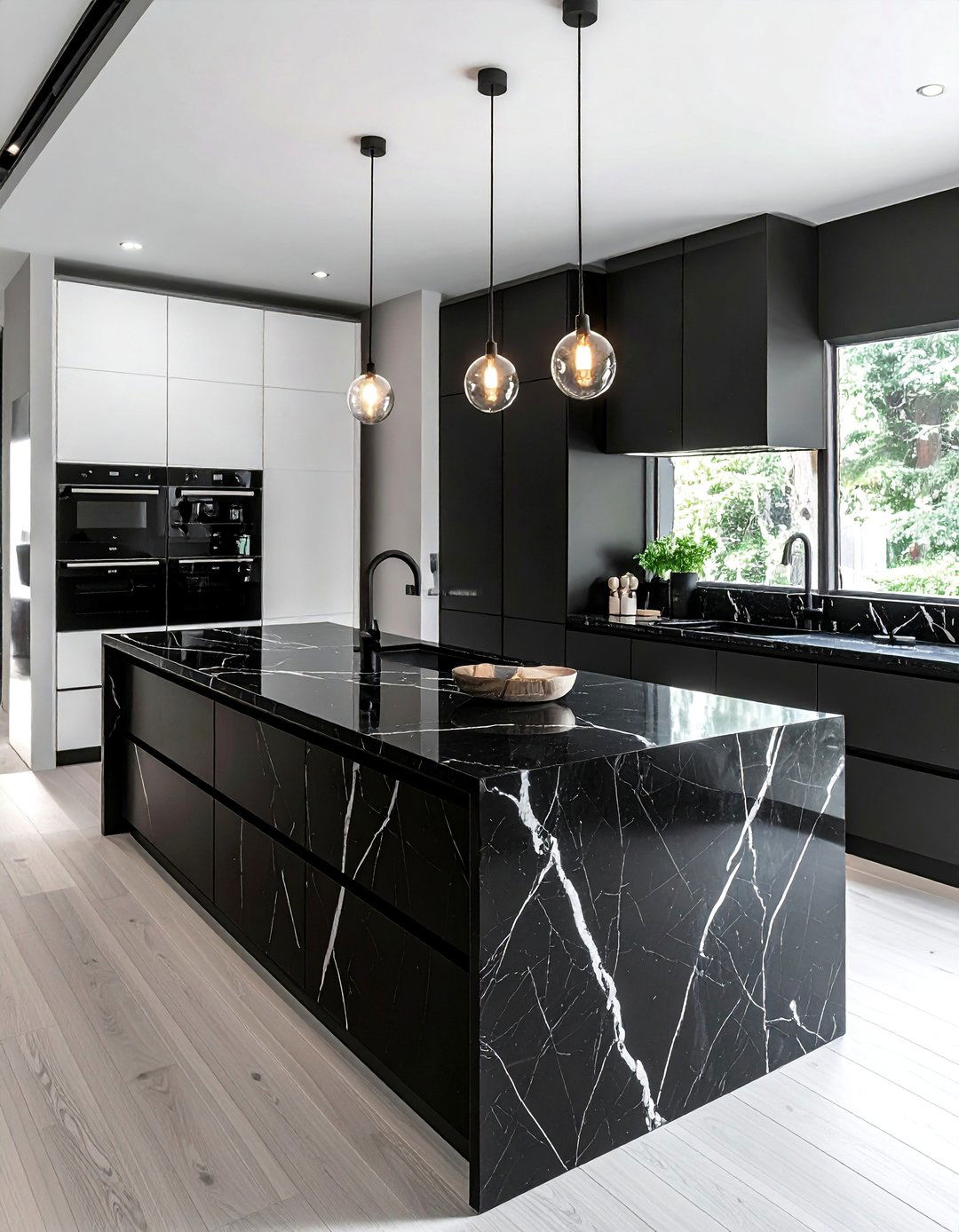 Black and White Kitchen with a Stone Slab Backsplash - 40 Black and White Kitchen Ideas for a Classic and Chic Space