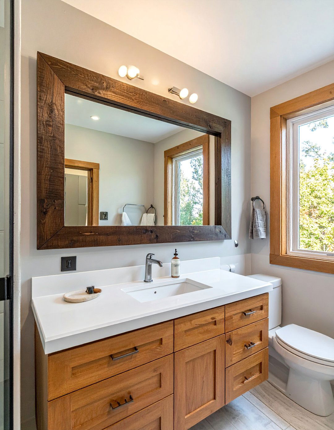 DIY Framed Builder Grade Mirror - 25 Small Bathroom Ideas on a Budget for Big Impact