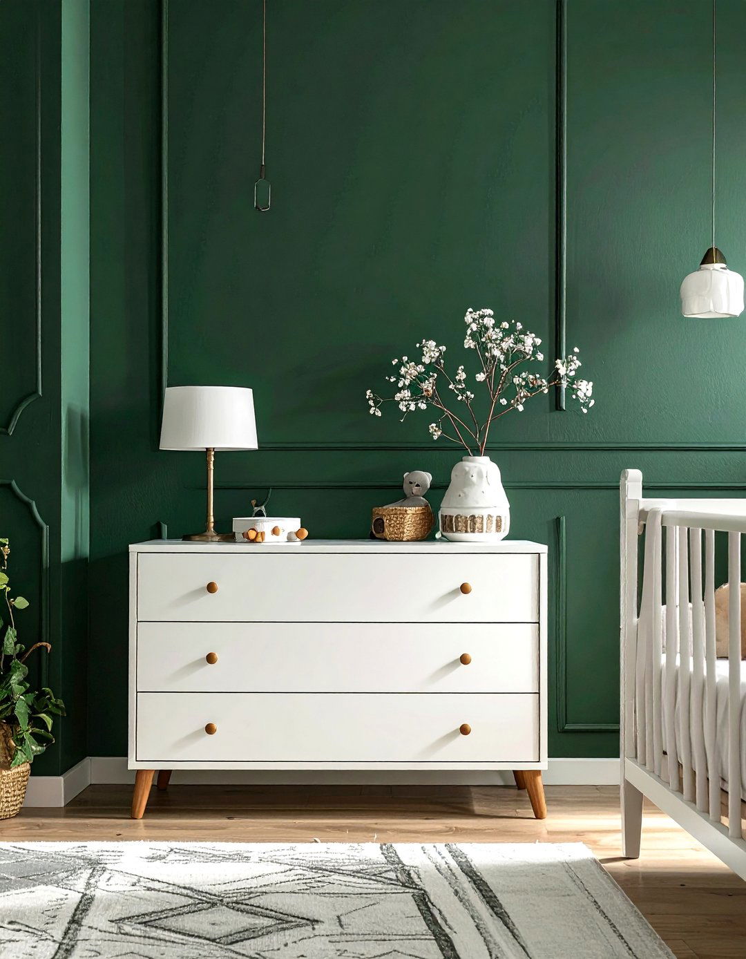 Dark Green Nursery Accentuated with Leather Pulls - 25 Dark Green Nursery Ideas for a Calming Space