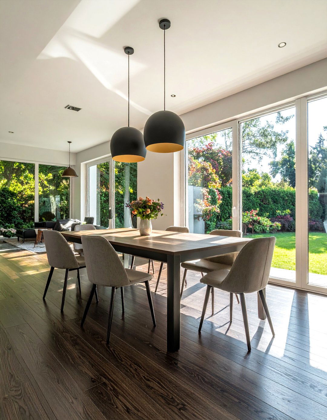Dark Wood Floor Dining Room with Expansive Windows - 15 Dark Wood Floor Dining Room Ideas for a Sophisticated Look