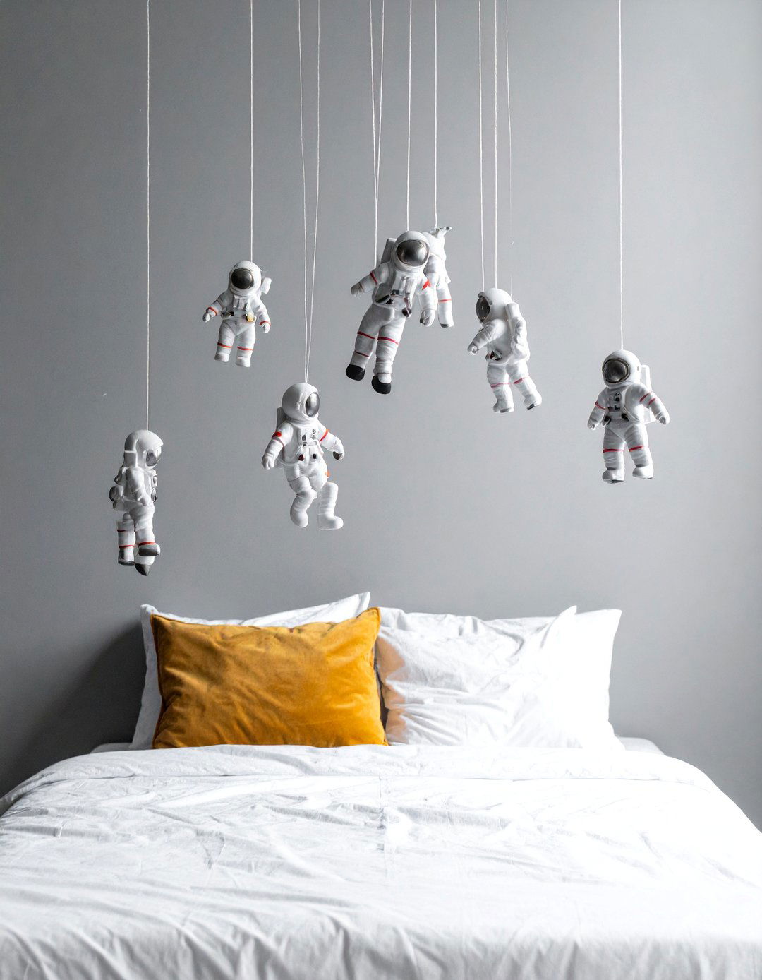 Floating Astronaut Wall Decor - 20 Space-themed Room Ideas for a Cosmic Bedroom