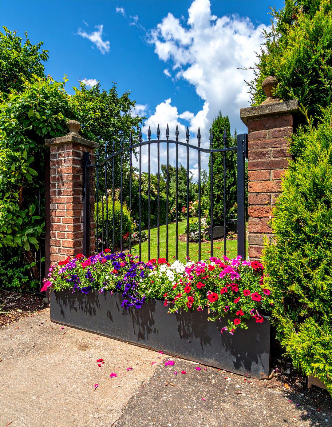 Metal Garden Gate with an Integrated Planter Box - 25 Metal Garden Gate Ideas for a Stylish Entrance