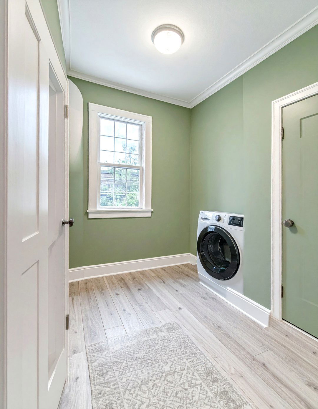 Sage Green Walls and Crisp White Trim - 15 Sage Green Laundry Room Ideas for a Calm Space