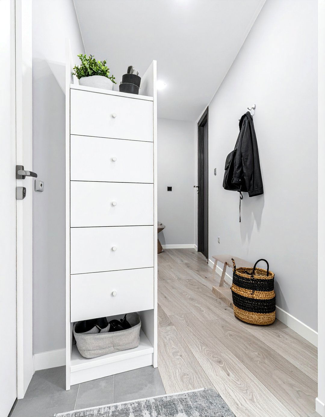 Scandinavian Entryway Using a Slim Shoe Cabinet - 20 Scandinavian Entryway Ideas for a Cozy Home