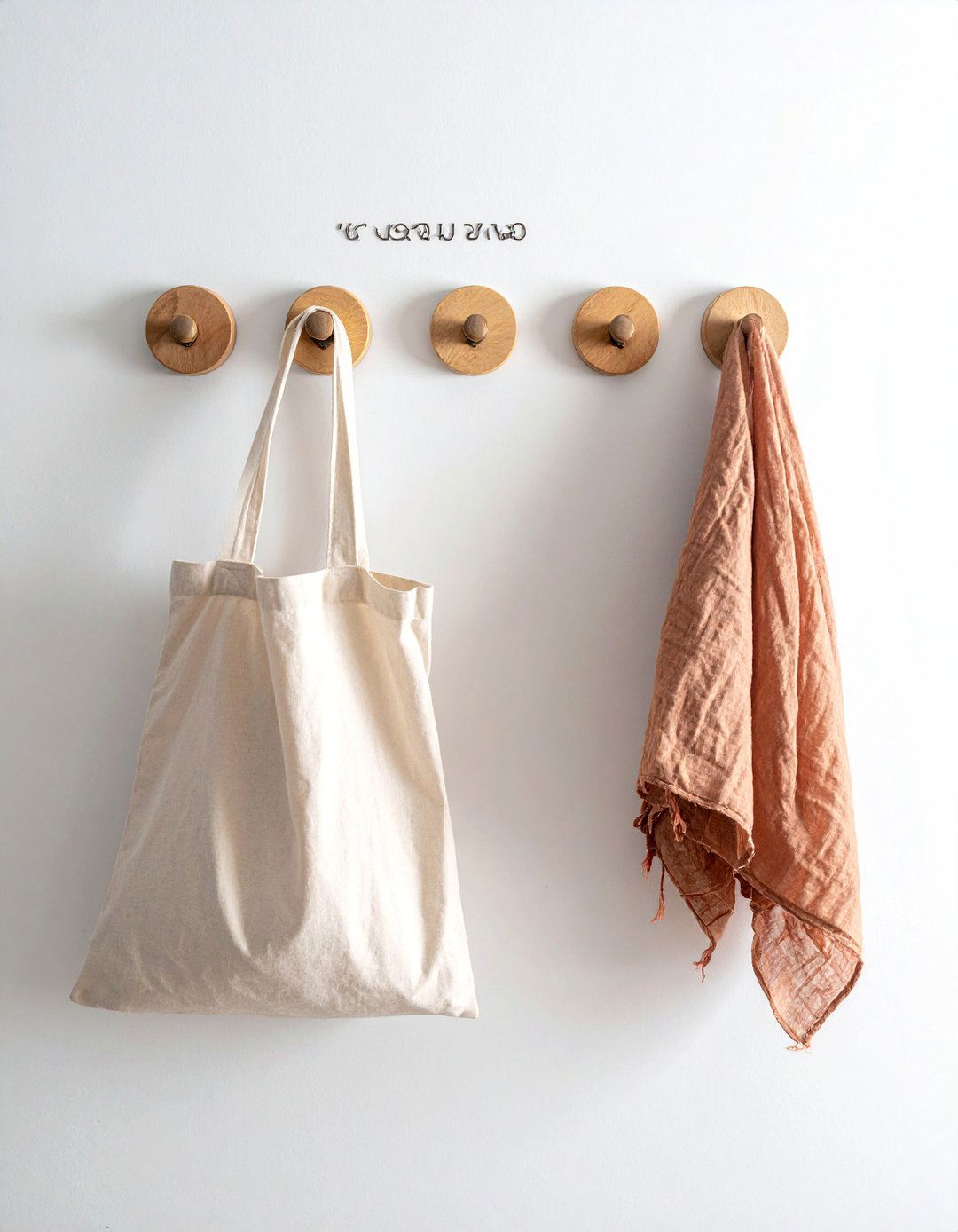 Scandinavian Entryway with Streamlined Wall Hooks - 20 Scandinavian Entryway Ideas for a Cozy Home