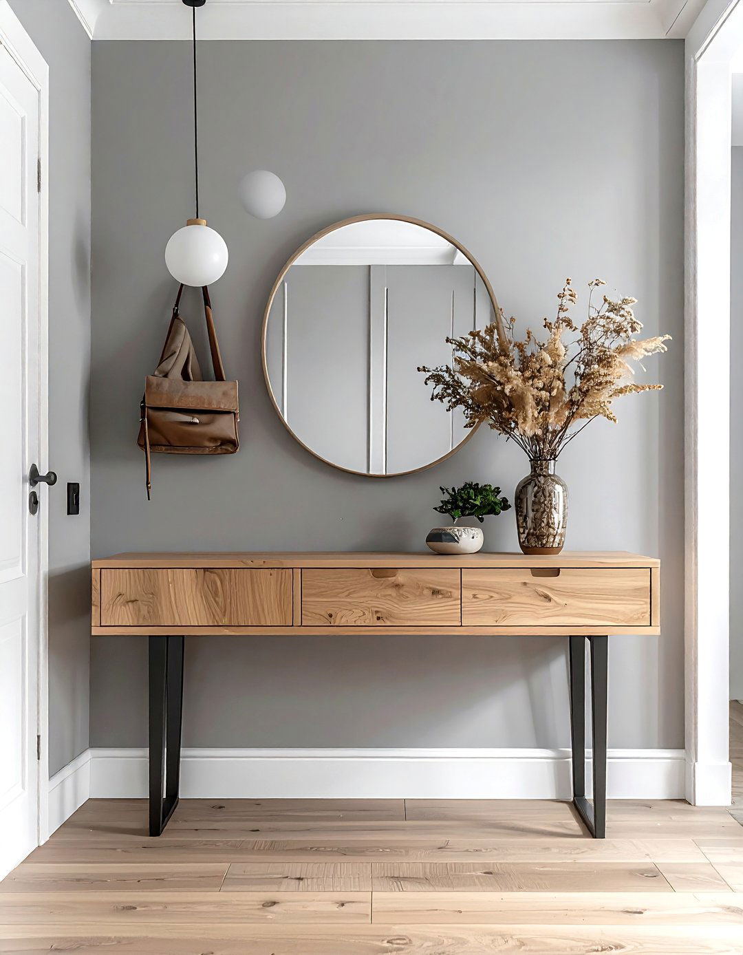 Scandinavian Entryway with a Floating Console Table - 20 Scandinavian Entryway Ideas for a Cozy Home