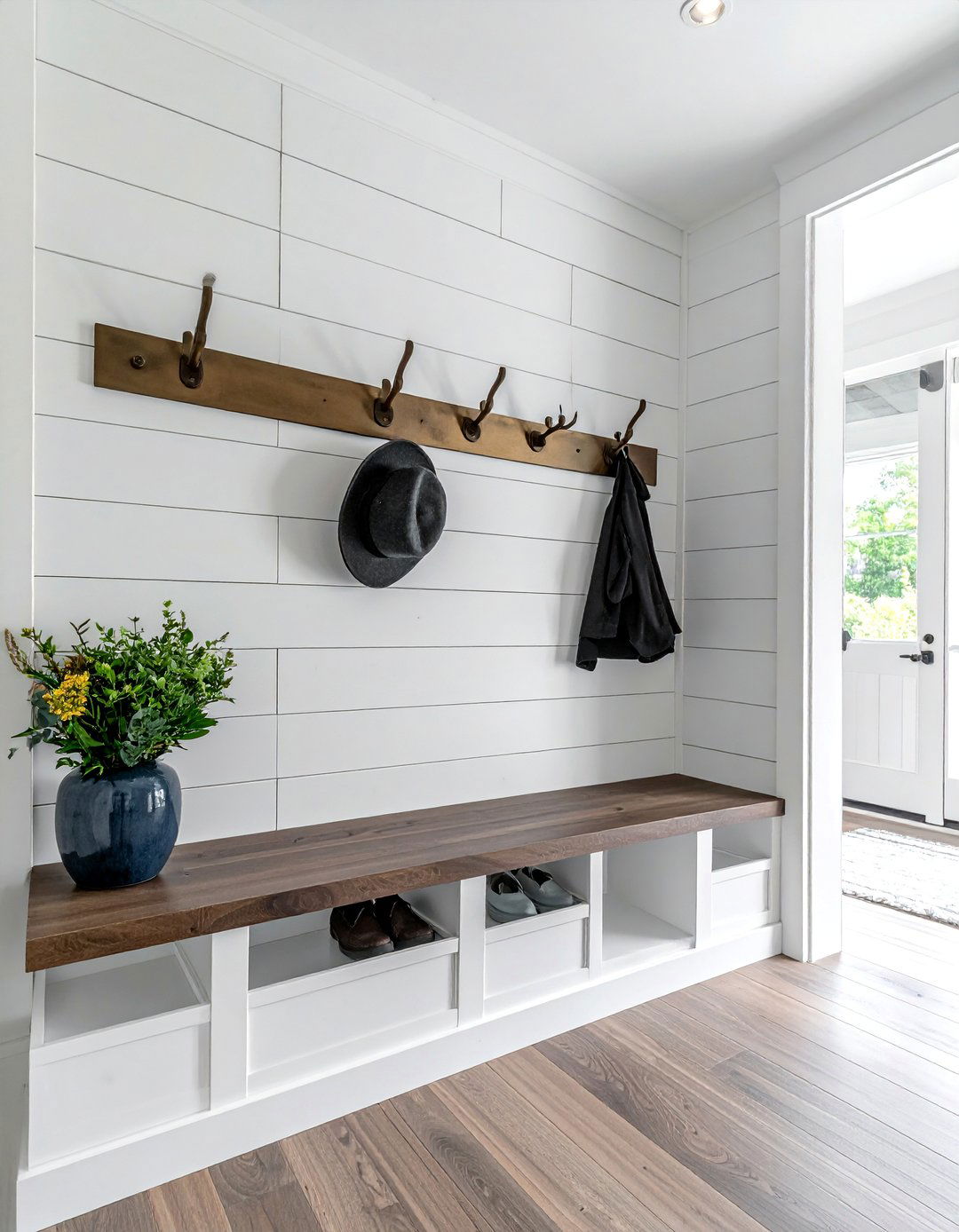 Shiplap Entryway with Integrated Hooks and Cubbies - 25 Shiplap Wall Entryway Ideas to Welcome Guests
