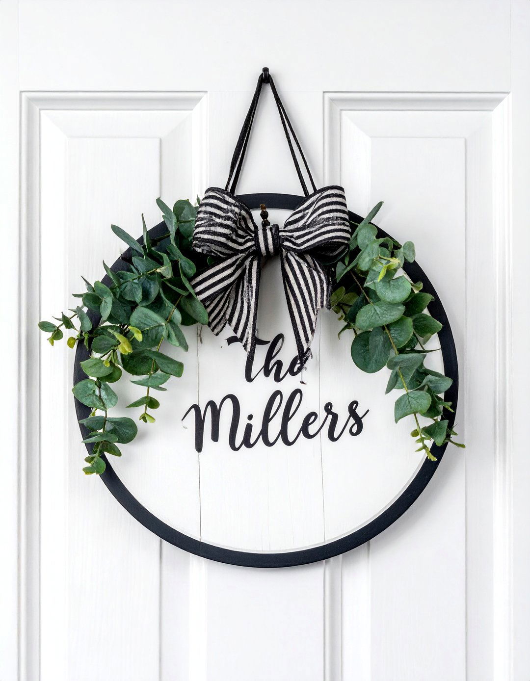 A Personalized Wooden Door Hanger - 15 Summer Front Door Decor Ideas for a Welcoming Entry