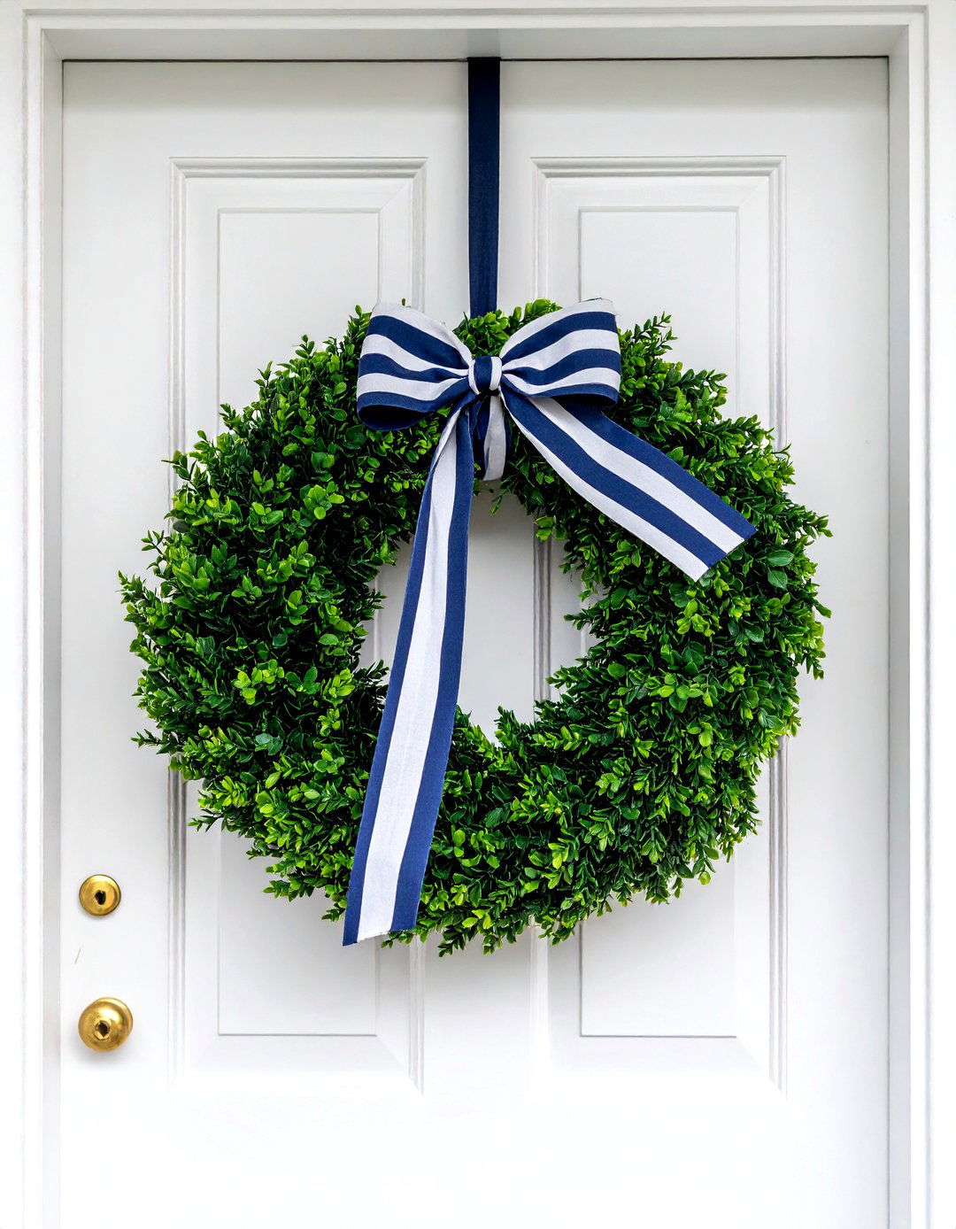 A Simple and Elegant Boxwood Wreath - 15 Summer Front Door Decor Ideas for a Welcoming Entry
