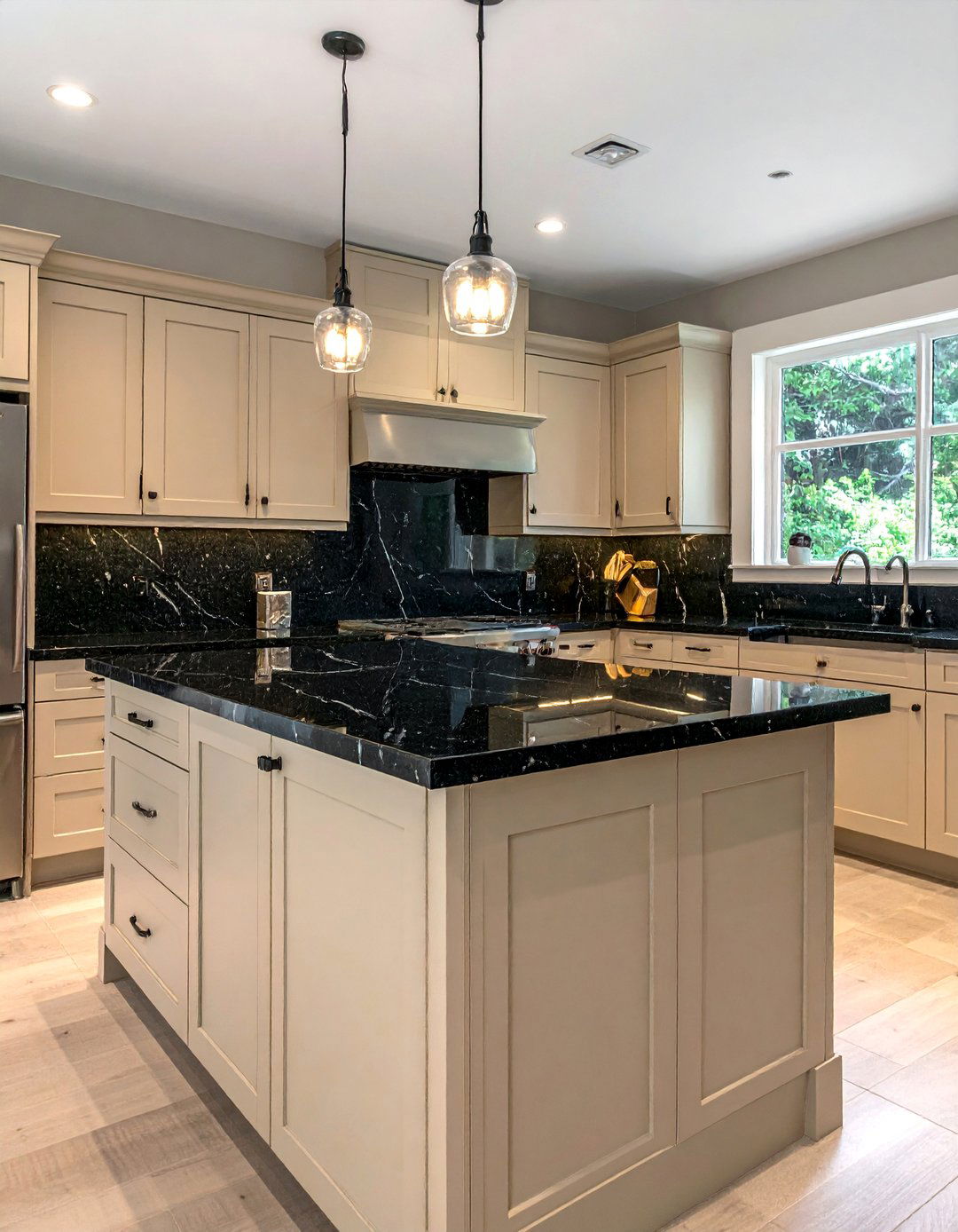 Black Countertops on Beige Cabinetry - 20 Black and Beige Kitchen Ideas for a Timeless Design