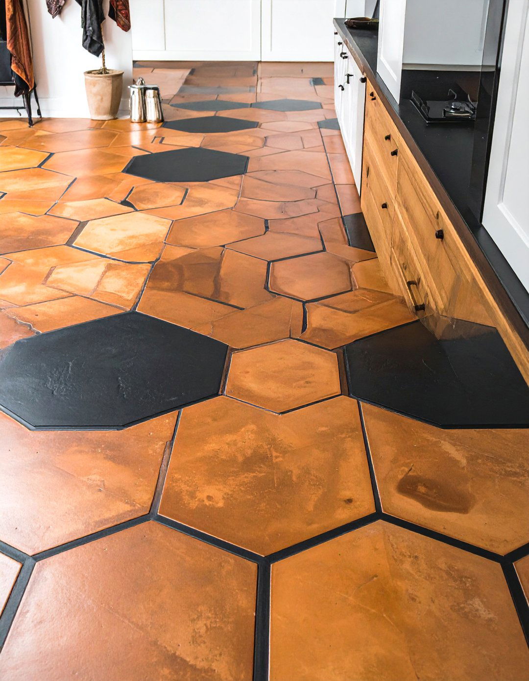 Black Grout with Brown Terracotta Tiles - 20 Black and Brown Kitchen Ideas for a Warm Aesthetic