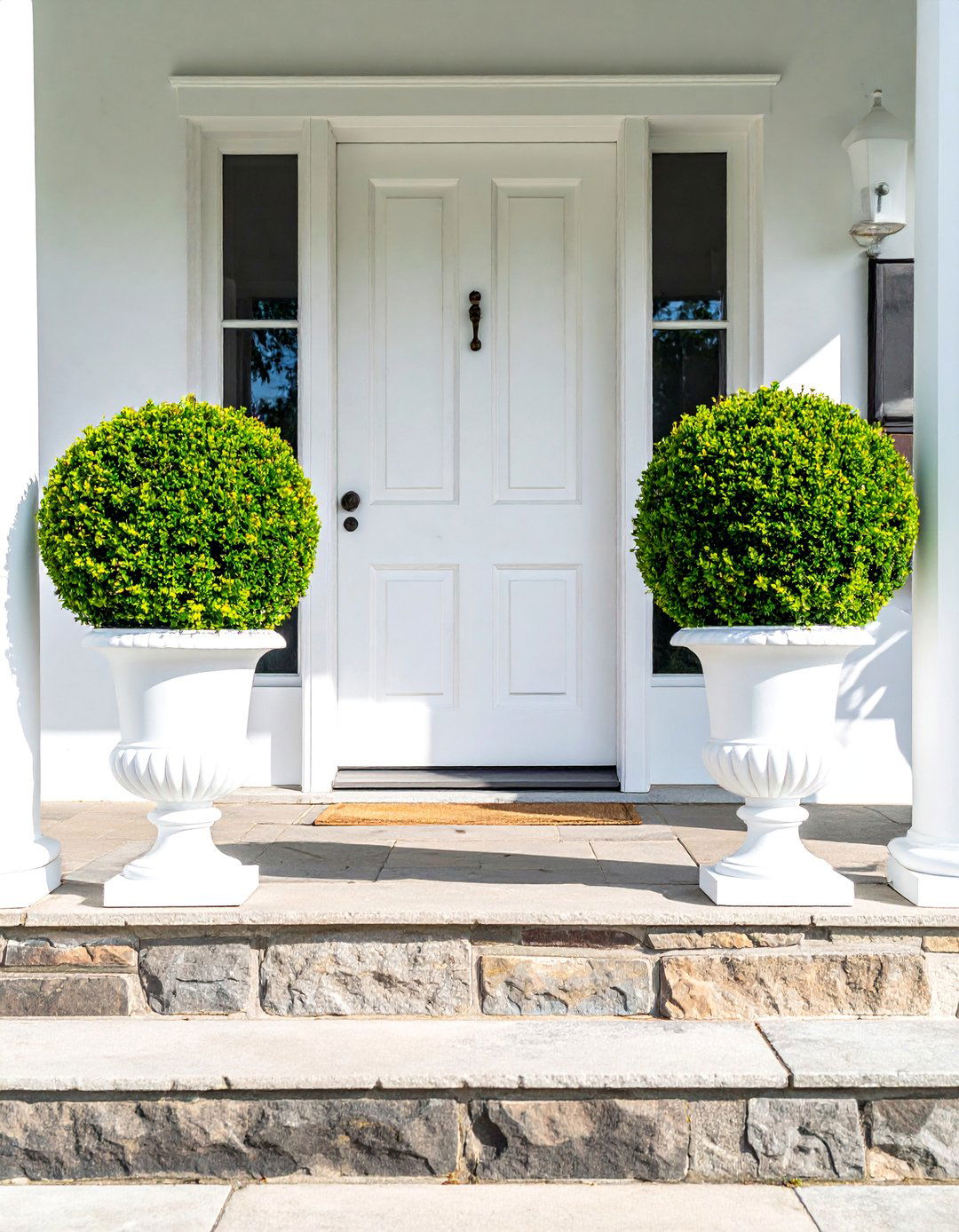 Cottage Front Porch with Symmetrical Potted Topiaries - 15 Creative Cottage Front Porch Ideas for Cozy Homes