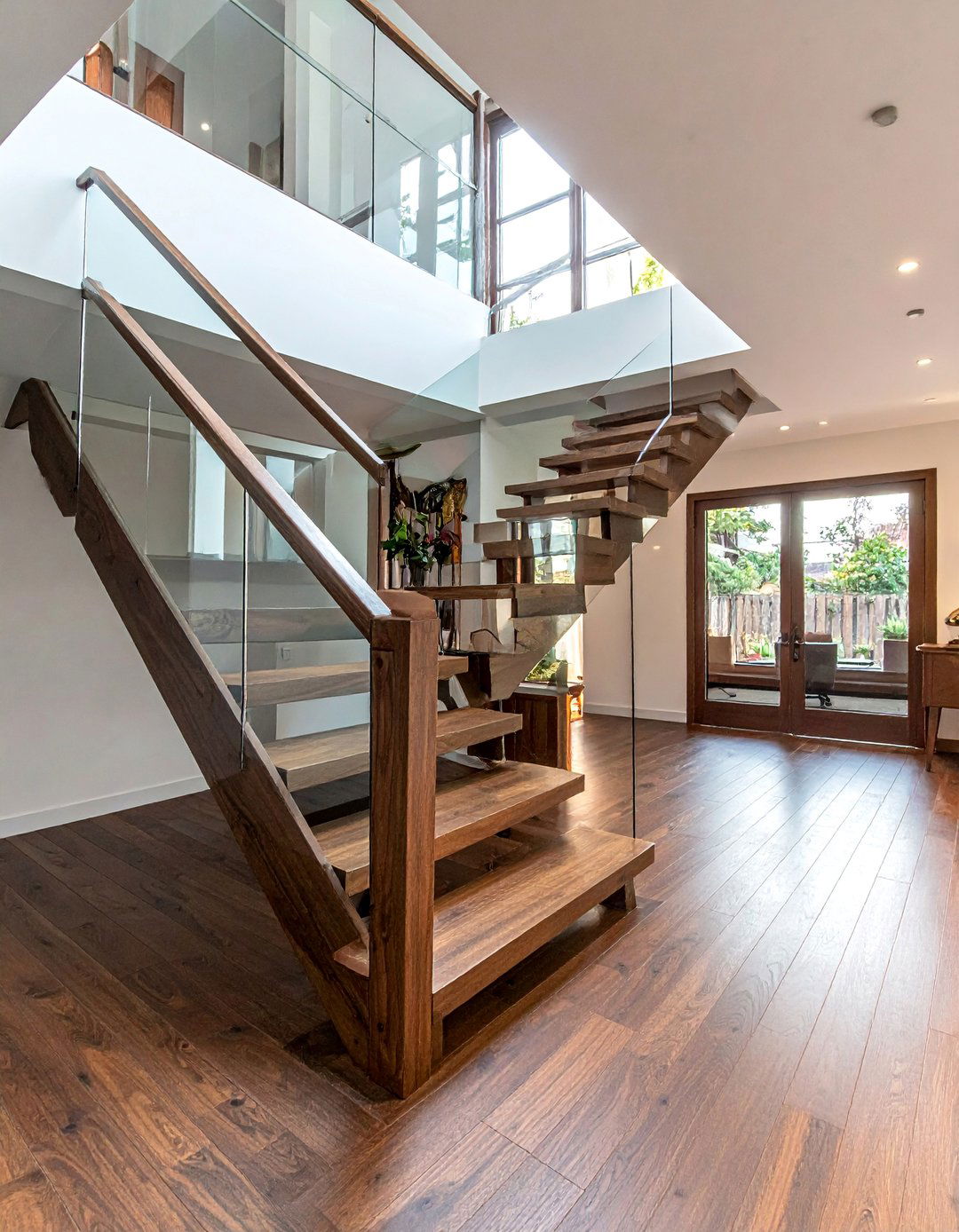 Dark Wood Staircase with Glass Balustrade - 20 Dark Wood Interior Design Ideas for Your Home