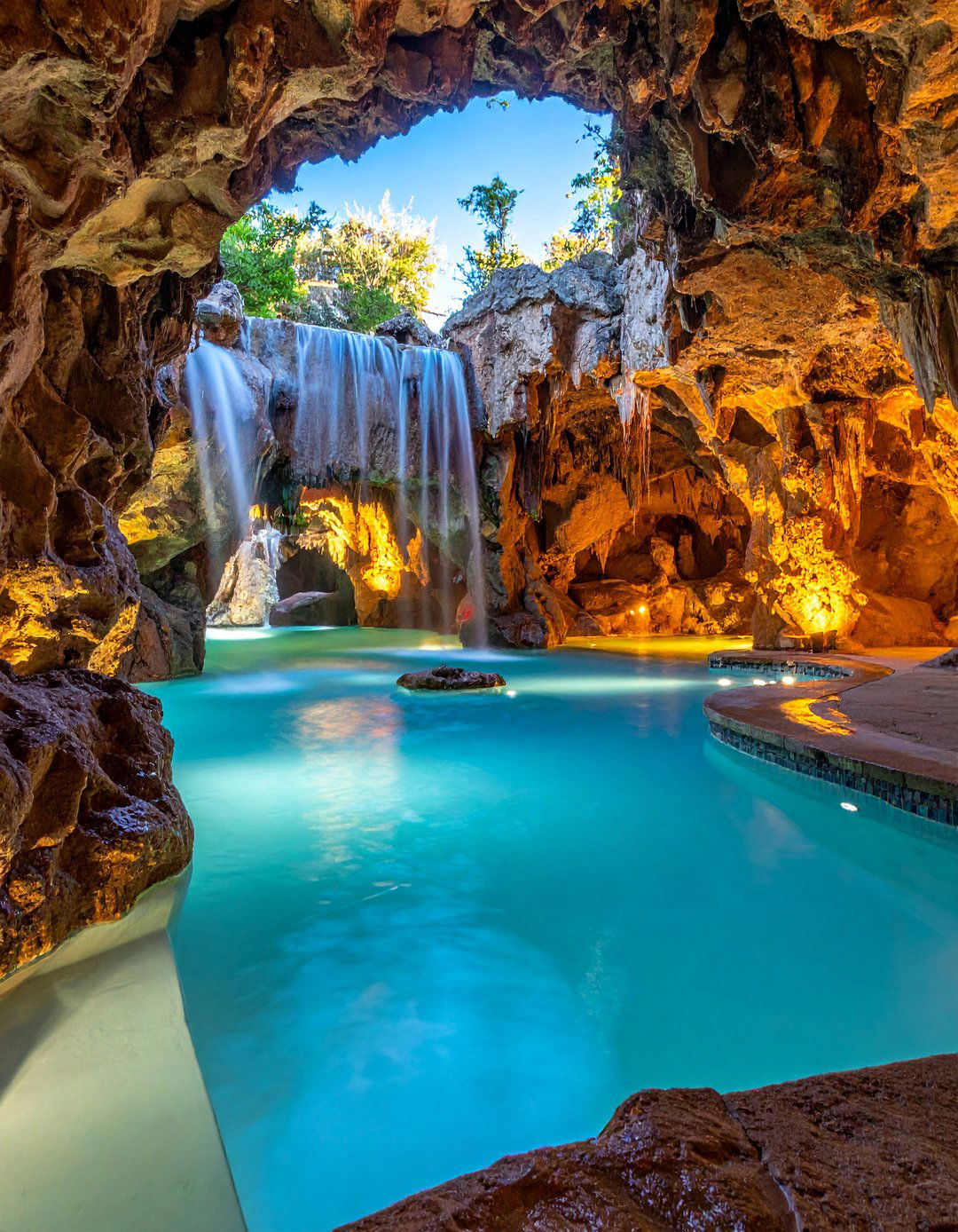 Grotto Waterfall Designs - 15 Pool Fountain Ideas for a Luxurious Backyard Oasis