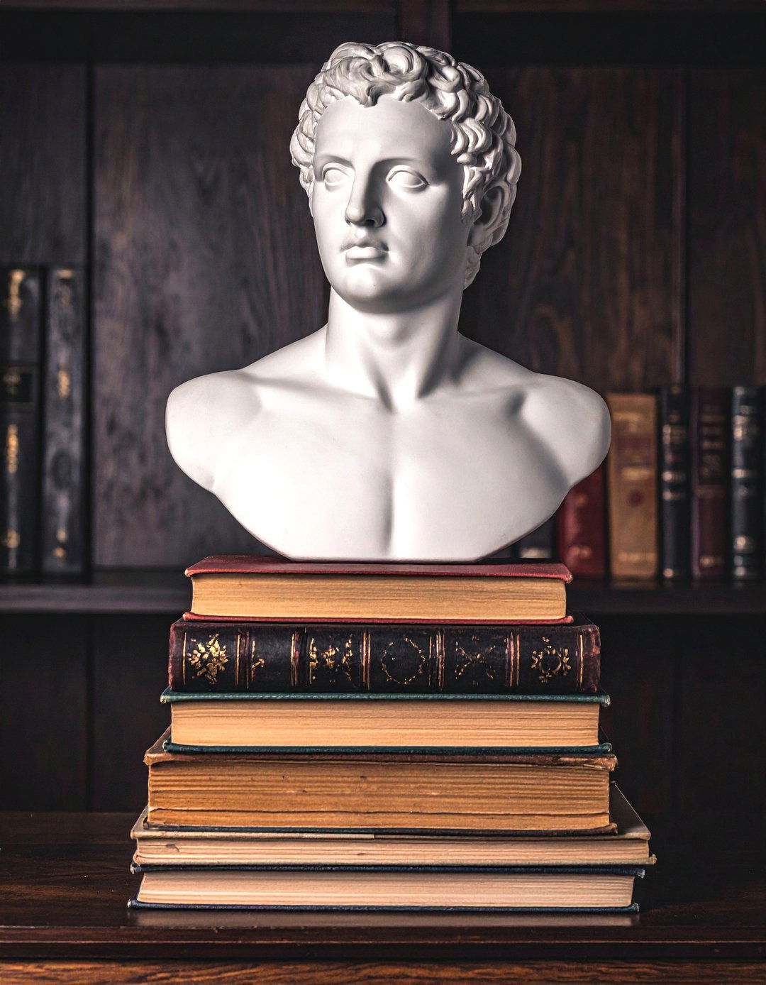 Incorporating Classical Bust Sculptures - 20 Dark Academia Home Office Ideas for a Moody Vibe