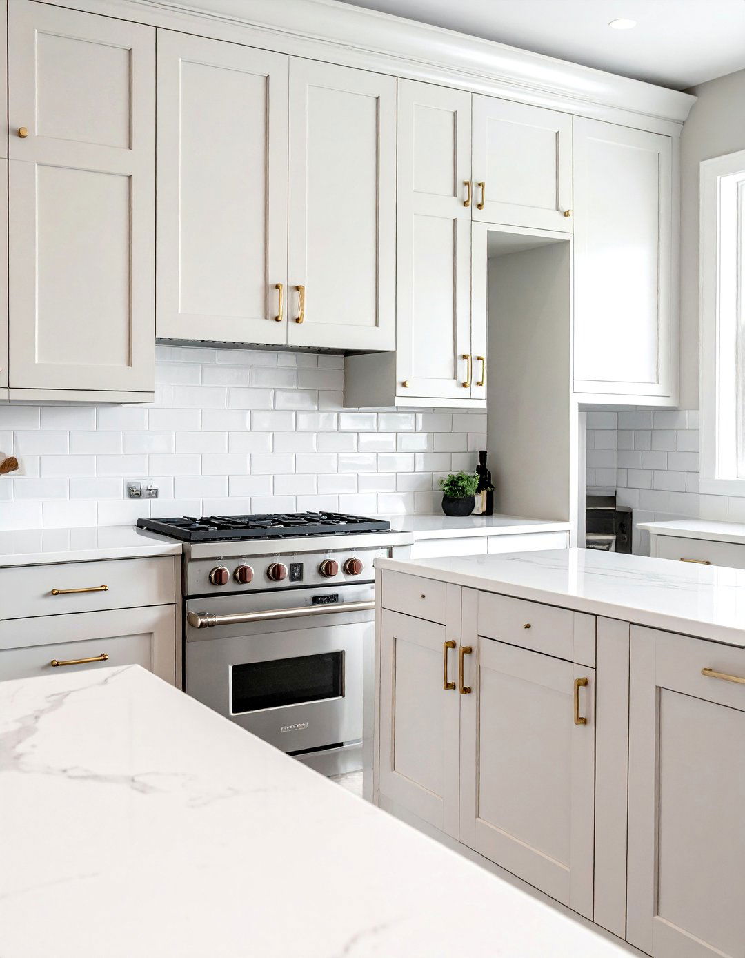 Off white Shaker Cabinets with Brass Hardware - 15 Off-white Kitchen Cabinets for a Timeless Look
