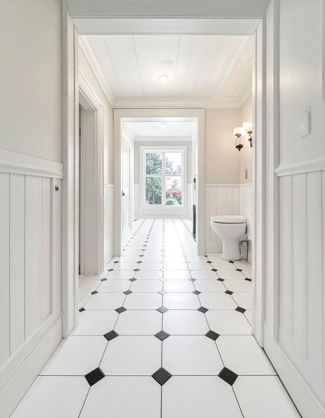 Pinwheel Black and White Bathroom Tile Floor - 20 Black and White Bathroom Tile Ideas for a Sleek Look