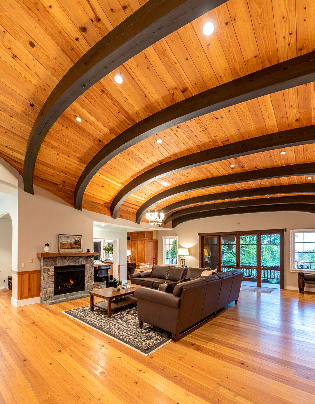 Rustic Wood Plank Barrel Ceiling with Exposed Beams - 20 Barrel Ceiling Ideas for a Unique Architectural Feature