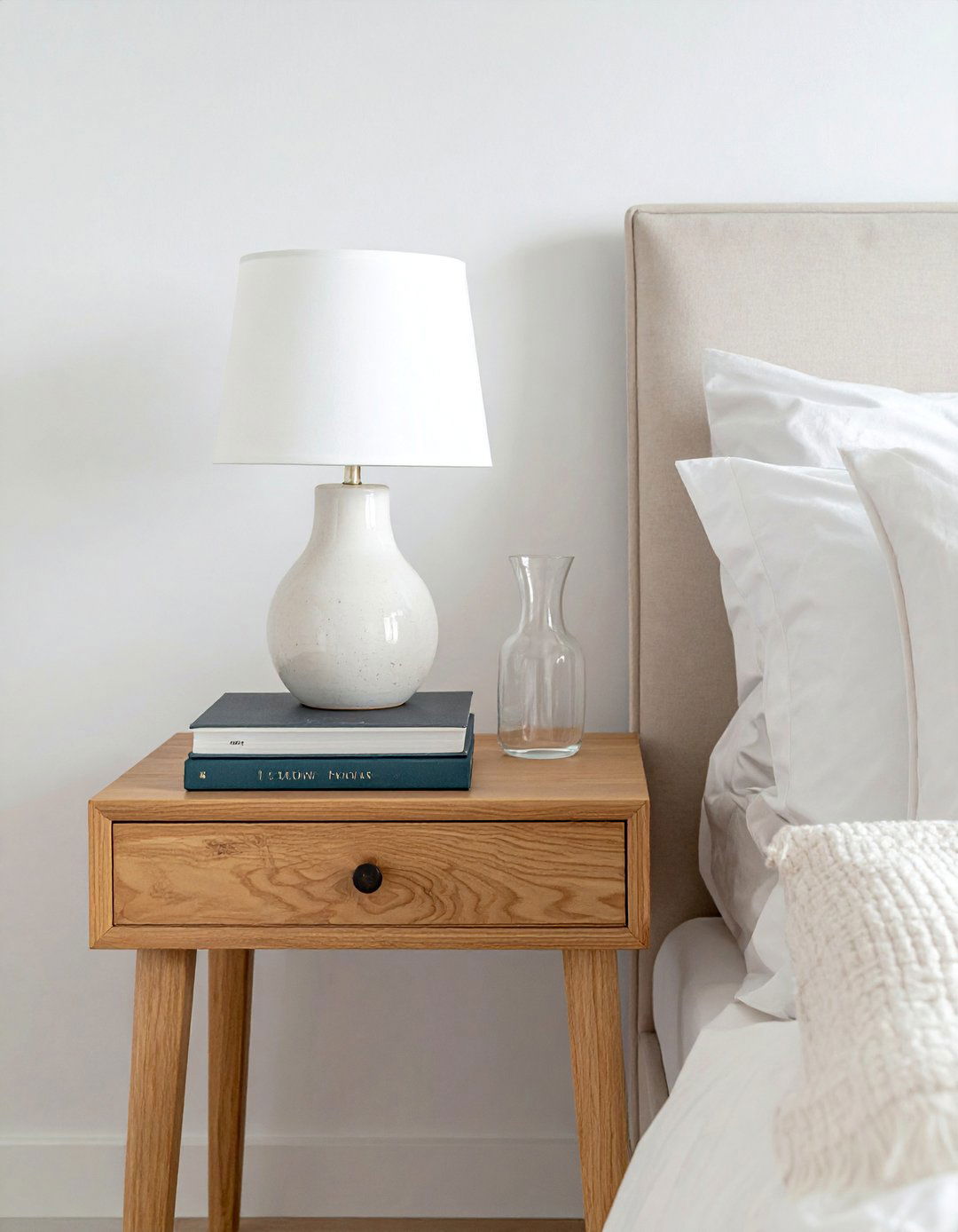Thoughtfully Curated Bedside Tables - 20 Nancy Meyers Interior Design Ideas for Cozy Spaces