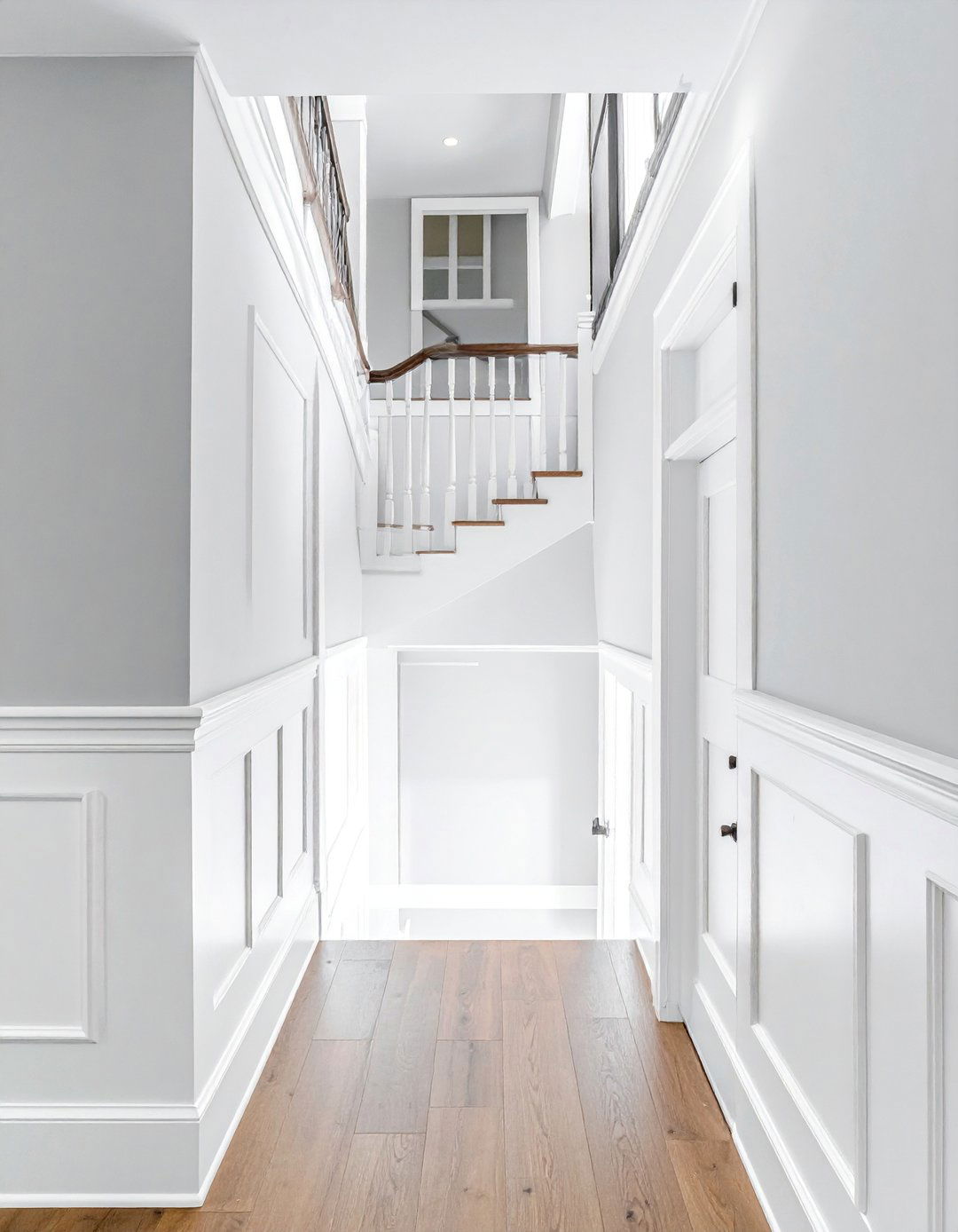 Wainscoting Extending Up a Staircase - 25 Wainscoting Entryway Ideas to Elevate Your Home