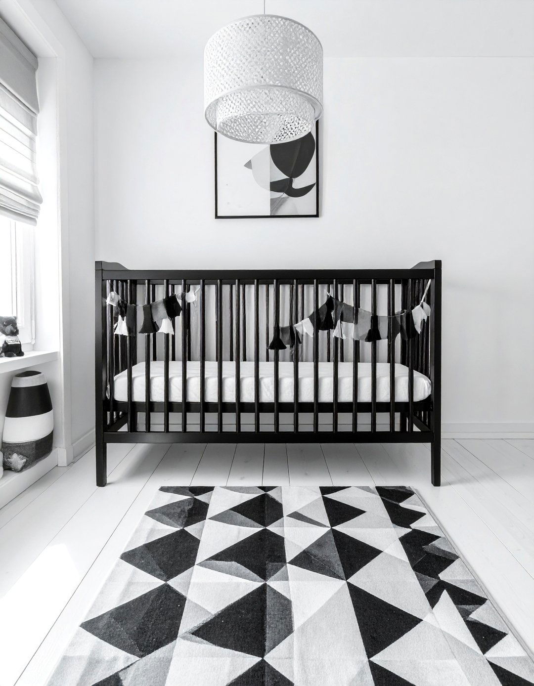 White Nursery with Black Contrasting Elements - 15 White Nursery Ideas for a Calm and Serene Space