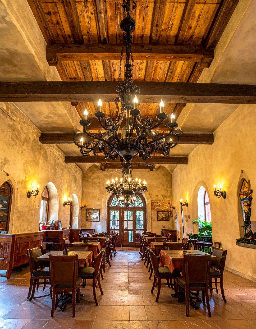 Wrought Iron Accents and Fixtures - 20 Italian Restaurant Decor Ideas for an Authentic Ambiance