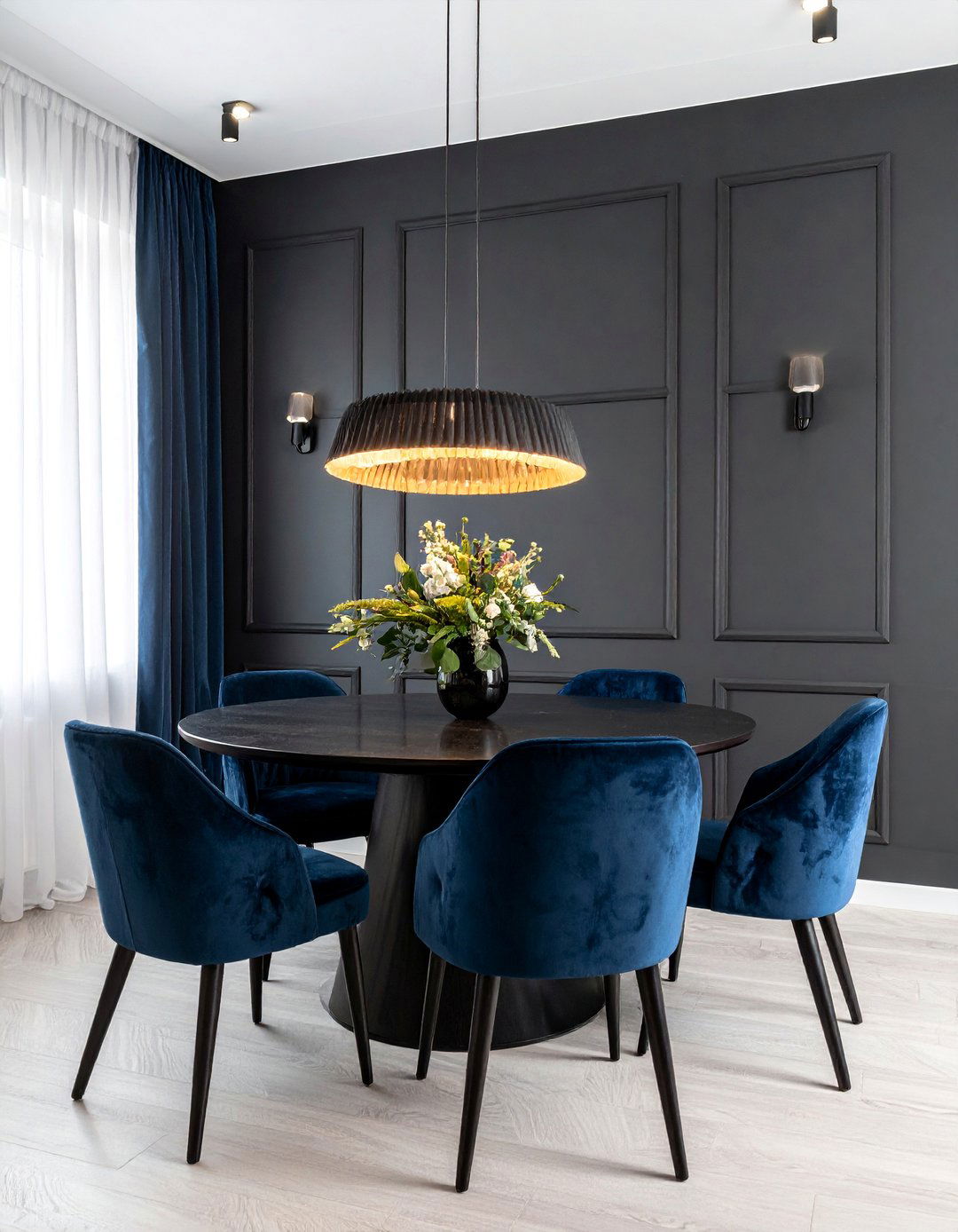 A Moody Dining Room with a Dark Charcoal Wall - 20 Black Accent Wall Dining Room Ideas for a Bold Statement