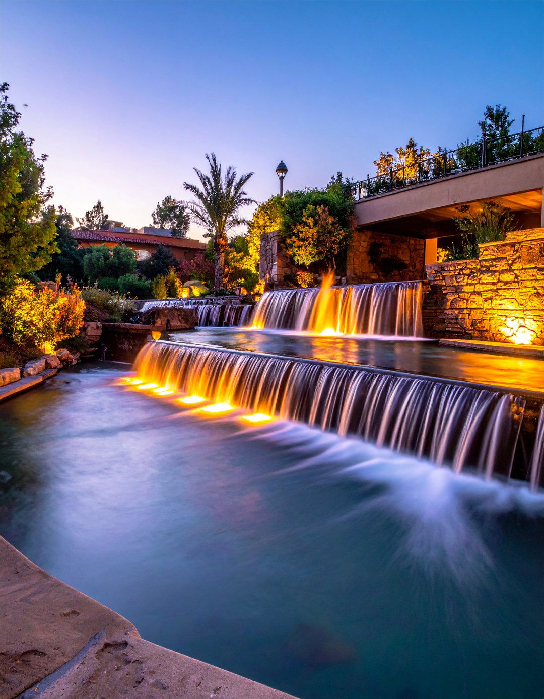 Fire and Water Combination Features - 25 Waterfall Design Ideas for a Serene Outdoor Space