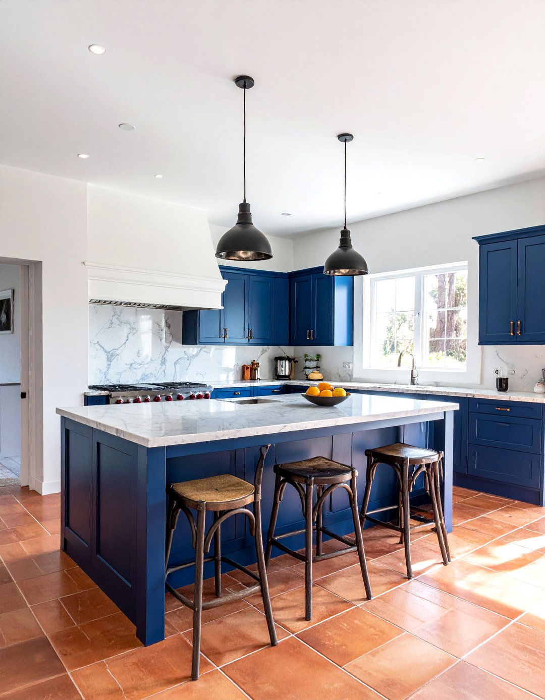 Terracotta Floor with a Blue Kitchen Island - 20 Terracotta Kitchen Floor Ideas for a Rustic Look