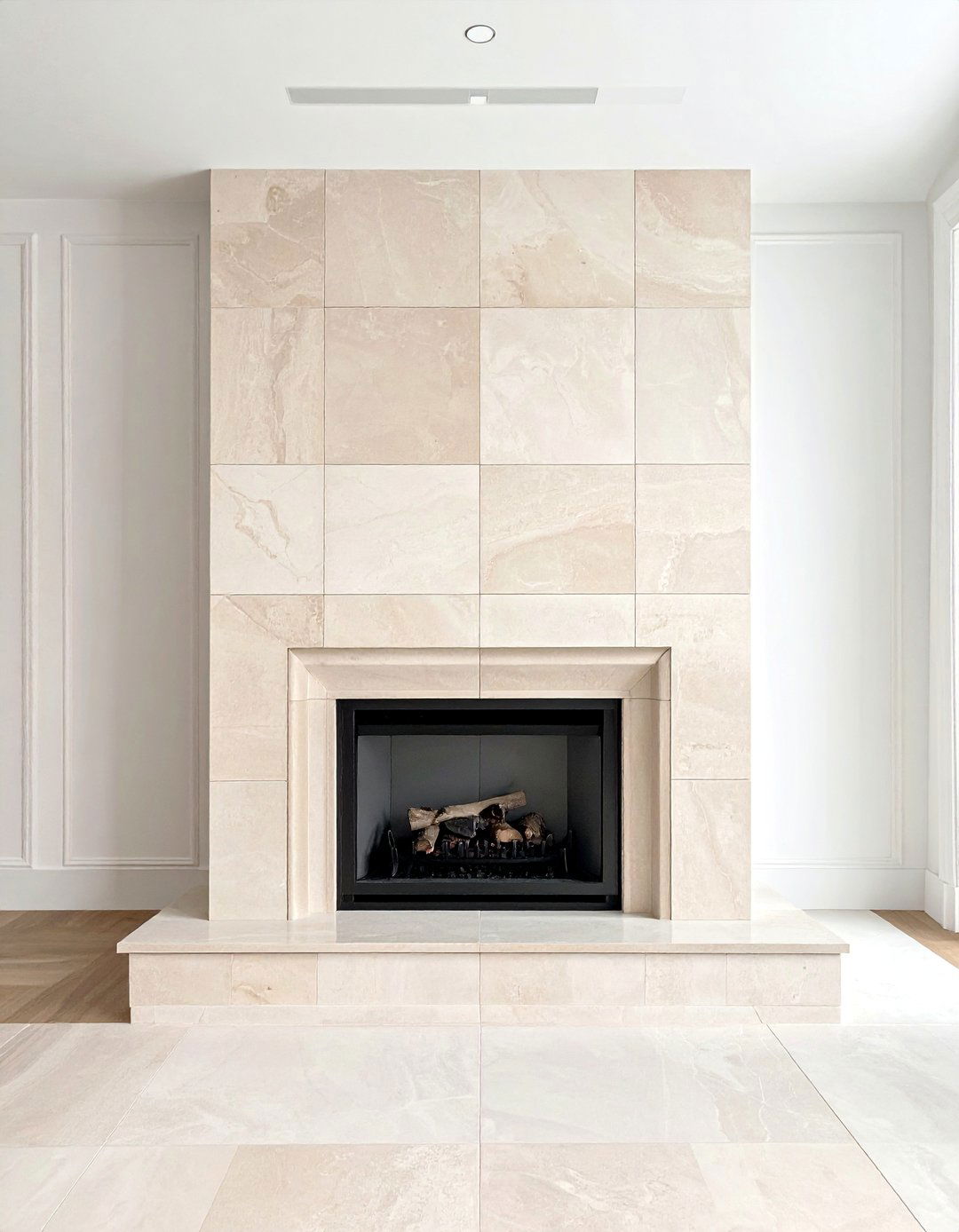 Transitional Fireplace with a Floor to Ceiling Limestone Surround - 20 Transitional Fireplace Ideas for a Timeless Look