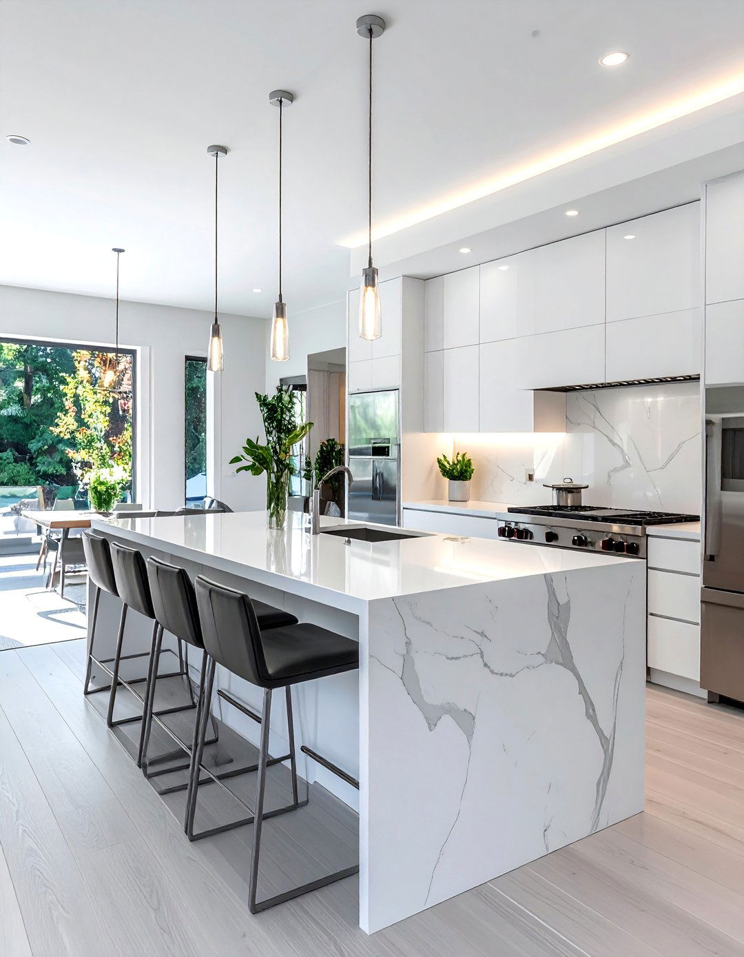 White Kitchen with a Waterfall Island and Stainless Steel Appliances - 25 White Kitchen with Stainless Steel Appliances Ideas