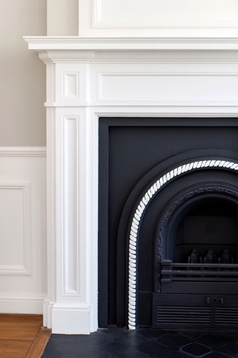 Black Fireplace with Contrasting White Surround Trim - 30 black fireplace ideas