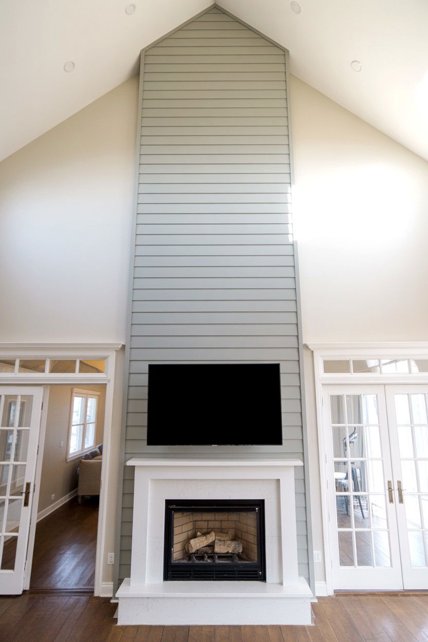 Vaulted Ceiling with Vertical Emphasis - 30 tv over fireplace ideas